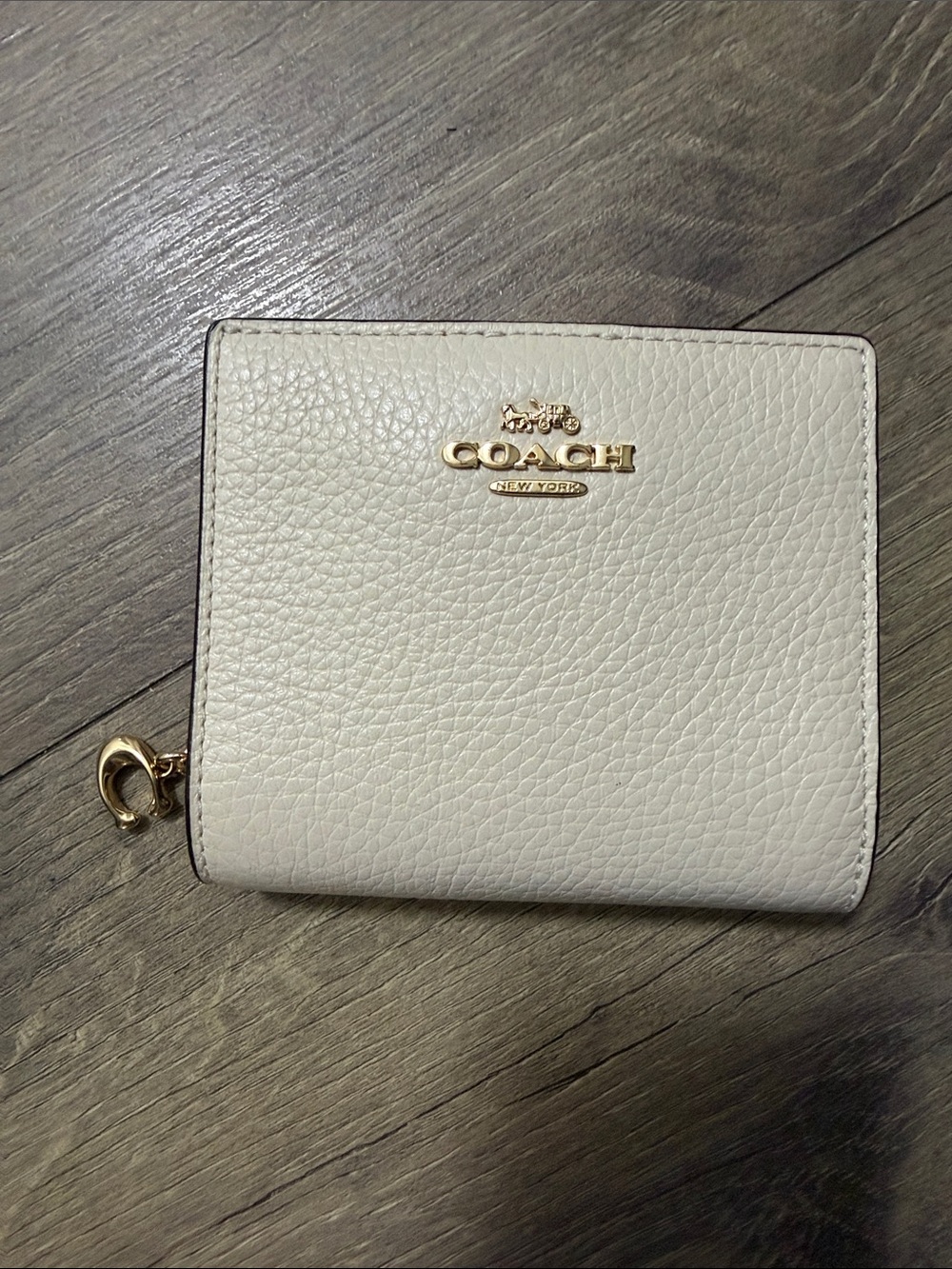 Coach Pebbled Leather Compact Wallet in Light Cream with Gold Hardware